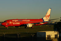 VH-VOC @ YSSY - taxiing to 34R - by Bill Mallinson