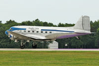 N28AA @ OSH - The Candler Field Express - a 1940 Douglas DC3A, c/n: 2239 - lands on the purple marker at 2011 Oshkosh - by Terry Fletcher