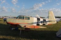 C-GAVX @ KOSH - Mooney M20C - by Mark Pasqualino