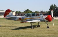 N352SH @ KOSH - YAK-52 - by Mark Pasqualino