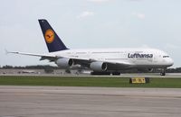 D-AIMD @ MCO - Lufthansa A380 rolling down the runway 18R
