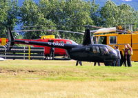 G-OHAM @ EGBJ - BBC TV  Top Gear presenter at Staverton with his R44 chatting with the fire crew - by Chris Hall