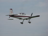 N133HS @ KOSH - landing Rwy09 at KOSH during EAA2011 - by steveowen