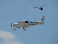 N447SR @ KOSH - landing Rwy 09 @ Oshkosh..EAA2011 - by steveowen