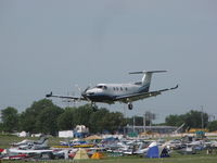 N68PK @ KOSH - Landing Rwy 09 at EAA 2011. - by steveowen