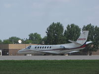 N569TA @ KOSH - Taxing back home after EAA2011.This A/C is based at Oshkosh - by steveowen