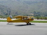 N23283 @ SZP - 1939 Piper J3C-65 CUB, Continental A&C65 65 Hp, landing roll Rwy 22 - by Doug Robertson