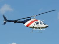 VH-JRE @ YMMB - JetRanger VH-JRE approaching the helipad at Moorabbin - by red750