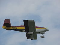 N910LL @ KOSH - landing @KOSH EAA2011 - by steveowen