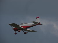 N678PR @ KOSH - landing EAA2011 - by steveowen