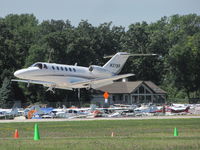 N379R @ KOSH - landing Rwy 09 EAA 2011 - by steveowen