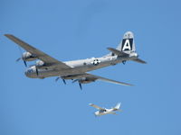 N529B @ KOSH - FiFi and  chase plane over EAA 2011,Good to her in the air again - by steveowen