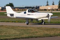 N5ZQ @ KOSH - Departing Airventure 2011. - by Bob Simmermon