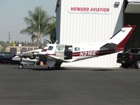 N316E @ POC - Parked at Howard Aviation with cowling off - by Helicopterfriend
