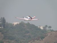 N70MV @ POC - Headed west into a smoggy day with wheels retracted - by Helicopterfriend
