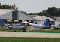 N5827Q @ KOSH - Mooney M20E - by Mark Pasqualino