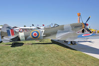 N280TP @ OSH - 1945 Vickers Supermarine SPITFIRE MARK XVIII, c/n: 6S-676372-165 at 2011 Oshkosh - by Terry Fletcher