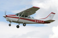 G-AYCJ @ EGBR - Cessna TP206D Super Skylane at Breighton Airfield's Summer Fly-In, August 2011. - by Malcolm Clarke