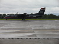 N328EN @ KCHO - CHO up and running during Hurricane Irene - by Ronald Barker