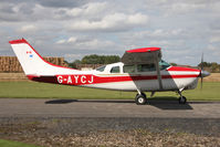 G-AYCJ @ EGBR - Cessna TP206D Super Skylane at Breighton Airfield's Summer Fly-In, August 2011. - by Malcolm Clarke