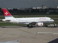 9H-AEG @ LFPO - Air Malta both serves CDG and ORY, but most services are operated from the latters. A few years ago, KM moved from South to West terminal where it calls at the bordeless part from with Echo-Golf is push-backed by a crab - by Alain Durand