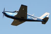 N7748P @ KOSH - Departing Airventure 2011. - by Bob Simmermon