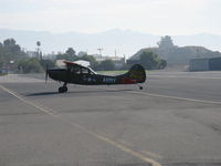 N354X @ SZP - 1957 Cessna L-19E BIRD DOG, Continental O-470-11B 213 Hp, taxi to refuel after STOL landing Rwy 22 - by Doug Robertson