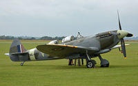 G-LFIX @ EGSU - THE GRACE SPITFIRE ON A DULL AND RAINY DAY - by Martin Browne