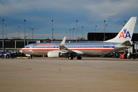 N968AN @ KORD - Tug pulls outbound AA jet from gate at Chicago O'Hare. - by Doug Wolfe