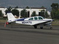 N5447U @ POC - Parked in transient parking area - by Helicopterfriend