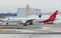 VH-VPF @ KLAX - One of two V Australia's 777s taxiing to parking area - by cx880jon