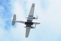 N8036E @ UGN - Overflying the field during the air show, bomb bay open - by Glenn E. Chatfield