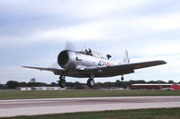 N332CA @ KDPA - Take-off on runway 27 - by Glenn E. Chatfield