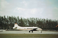 N121G @ MIA - Riley Heron of Shawnee Airlines taxying at Miami in November 1979. - by Peter Nicholson