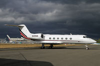 N405QS @ PAE - A storm was passing for this NetJets photo! - by Duncan Kirk