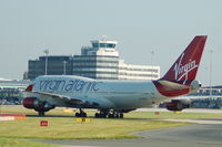 G-VXLG @ EGCC - Virgin Atlantic Boeing 747 taxiing at Manchester Airport. - by David Burrell