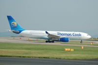 G-OJMB @ EGCC - Thomas Cook Airbus A330 Taxiing at Manchester Airport. - by David Burrell