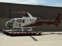 N686DT @ CNO - Parked on transport dolley next to hangers - by Helicopterfriend