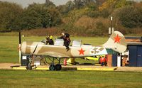 G-YAKH @ EGLM - Ex: DOSAAF 102 yellow > LY-AFV > RA-01948 > G-YAKH - Originally and currently owned to, Plus 7 Minus 5 Ltd since December 2002. In the colours of the, Soviet Air Force as 33. - by Clive Glaister