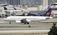 N490TA @ KLAX - Arriving at LAX - by Todd Royer