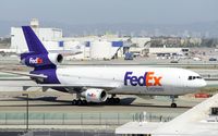 N314FE @ KLAX - Taxxing at LAX - by Todd Royer