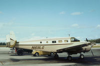 N169LG @ PBI - Florida Airmotive Beech D18S as seen at Palm Beach in November 1979. - by Peter Nicholson