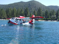 N64PN @ KTVL - Seabee Warbird was awarded the Grand Champion Seaplane Trophy at Oshkosh 2011. Seen here moored at a buoy on Lake Tahoe. - by Kim Lien