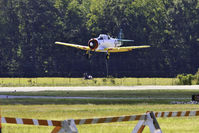 N6437D @ KGED - Landing at GED - Wings & Wheels 2010 - by M. Lee Derrickson