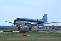 N12RB @ KDPA - C-47A 43-15935 ex-N890P arriving on Runway 10 - by Glenn E. Chatfield