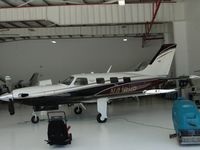 N418HP @ SEE - Parked in a hanger having maintenance performed - by Helicopterfriend