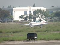 N2028A @ POC - Landing on runway 26L - by Helicopterfriend