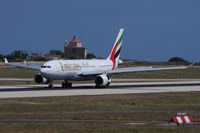 A6-EKU @ LMML - A330 A6-EKU Emirates Airlines - by raymond