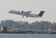 C-GLQN @ CYTZ - 2009 Bombardier DHC-8-402, c/n: 4254 of Porter Airlines - by Terry Fletcher