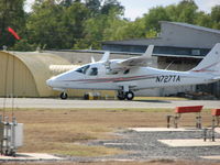 N727TA @ KDTN - Take off runway 14 - by Carl Hennigan